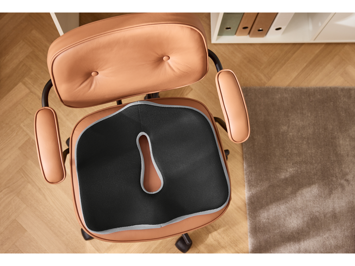 Coussin à mémoire de forme pour coccyx