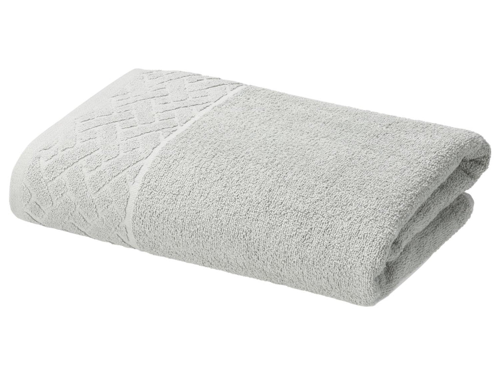 Serviette de douche ou drap de bain en éponge