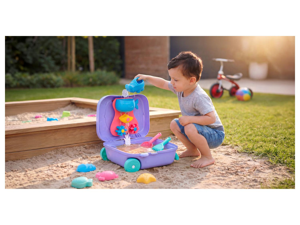 Valise à roulettes avec jouets de plage